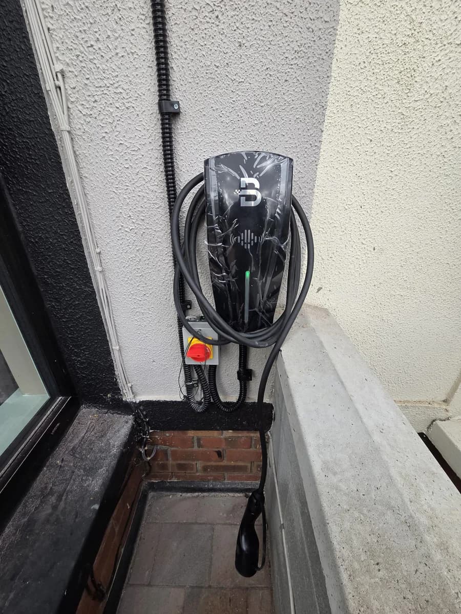 Completed Volt Éire home EV charger installation on an exterior wall.