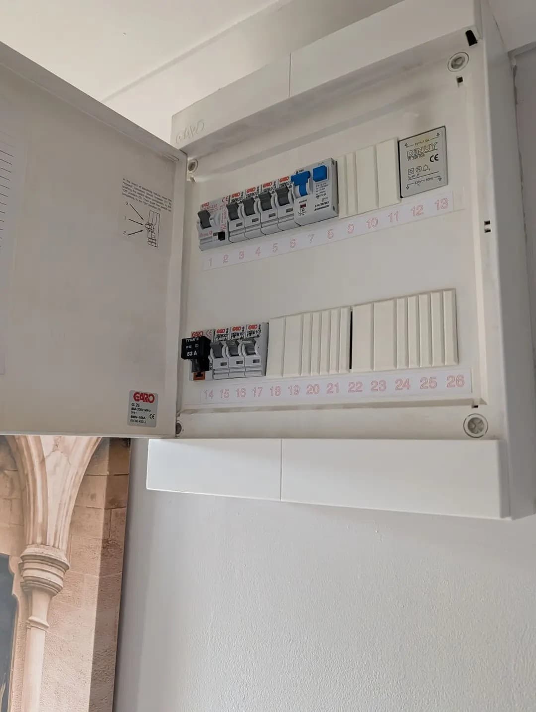 Modern open consumer unit with breakers visible